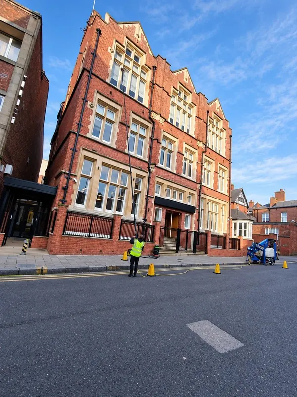 Window cleaning on a Victorian commercial building in Chester city centre